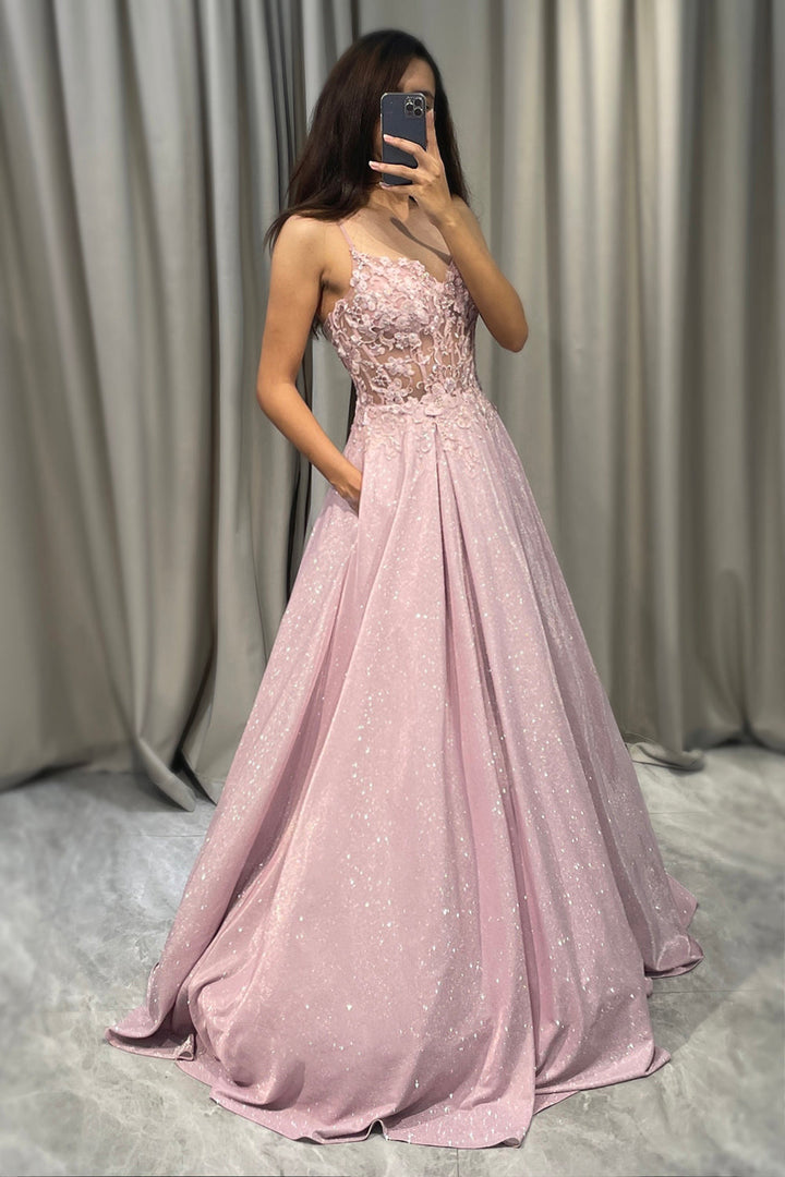 Sparkling blush pink A-line formal dress for women, featuring a flattering V-neck and delicate spaghetti straps.