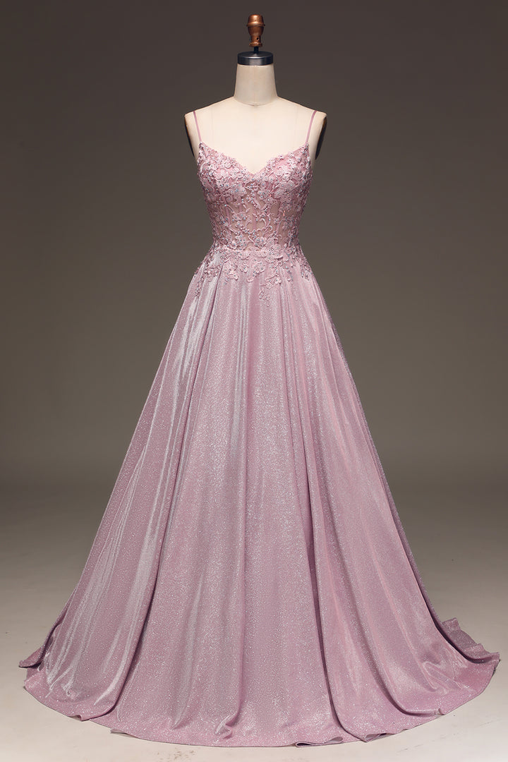 Luxurious sparkling blush ball gown, an A-line silhouette for prom or wedding guests, with V-neckline.