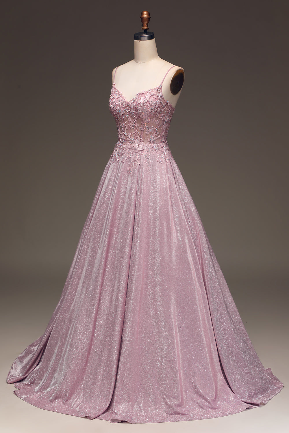 Beautiful blush pink sparkling A-line gown, perfect as a formal evening dress, prom dress or wedding guest attire.