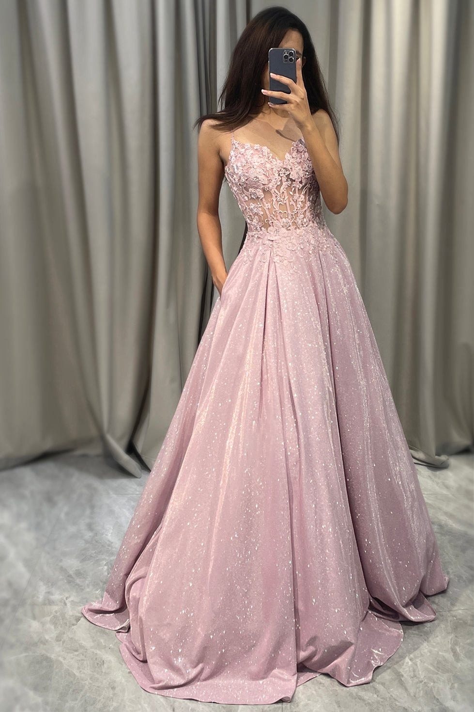 Women's sparkling blush A-line ball gown, perfect formal evening dress with V-neck and spaghetti straps.