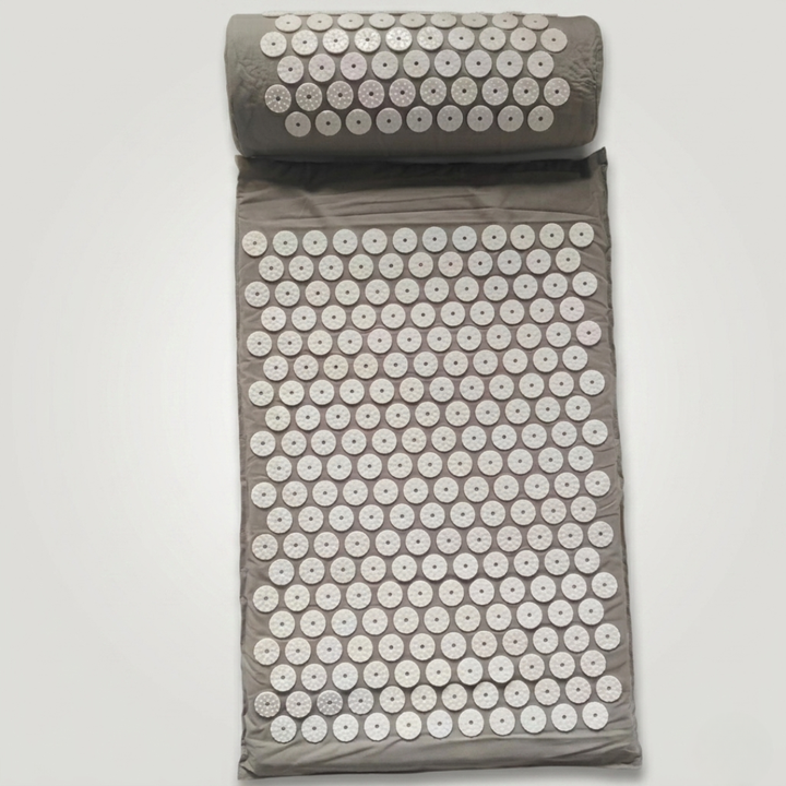 Ergonomic acupressure pillow for targeted neck & head massage, effective stress and tension relief.