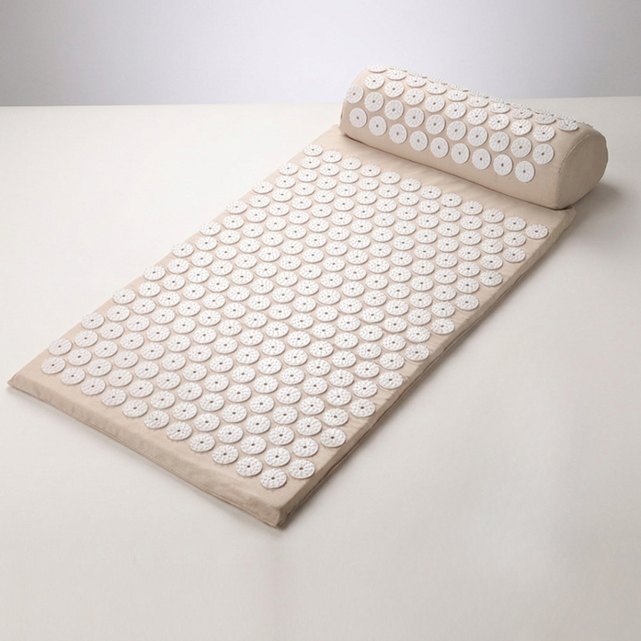 Unisex acupressure relaxation mat & pillow set, designed for stress management & overall well-being.