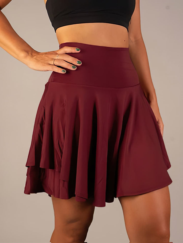 Women's athletic tennis golf skort with shorts & hidden pockets. Moisture-wicking activewear for fitness.