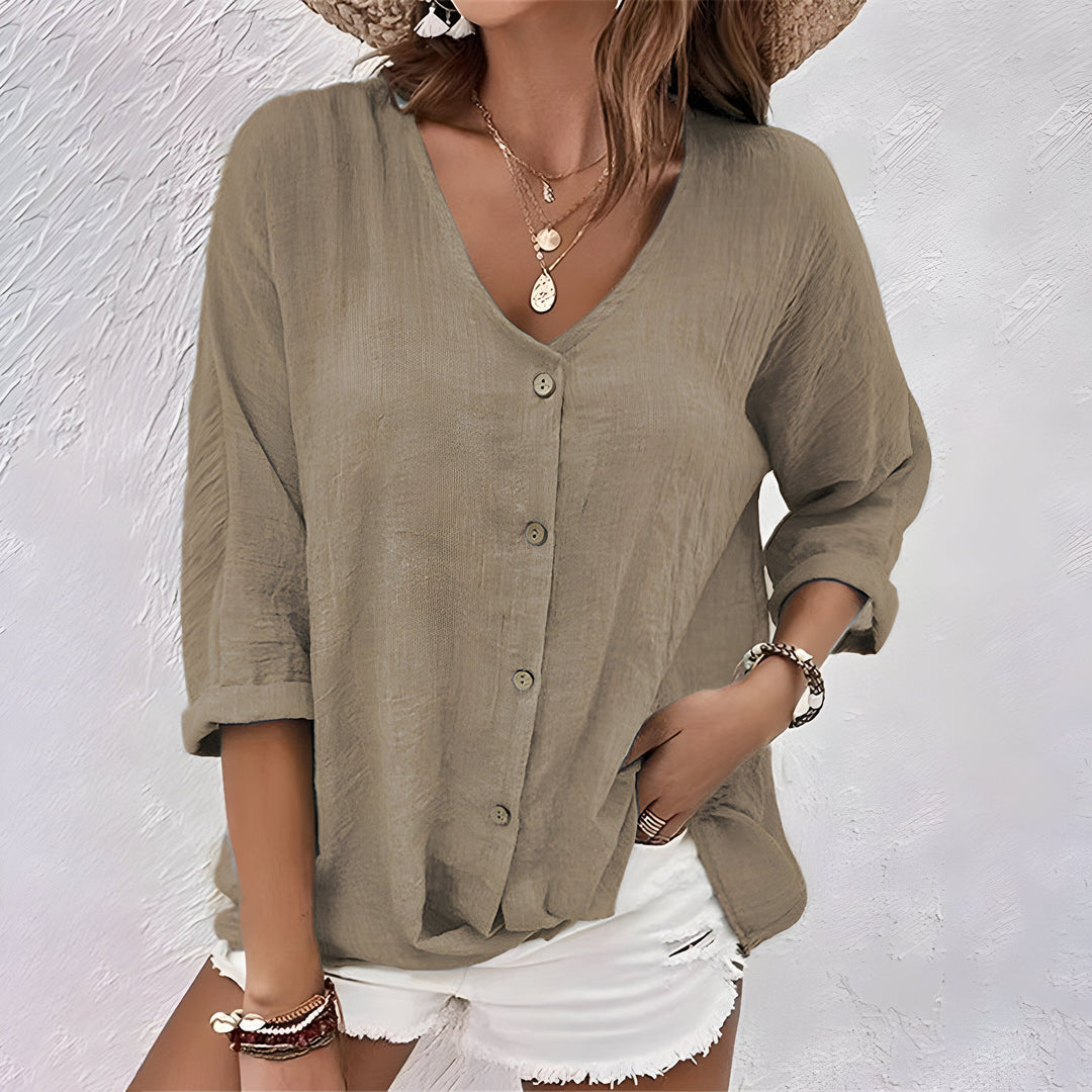 Casual womens V-neck blouse with front buttons & versatile roll-up sleeves. Great for daily wear & summer.