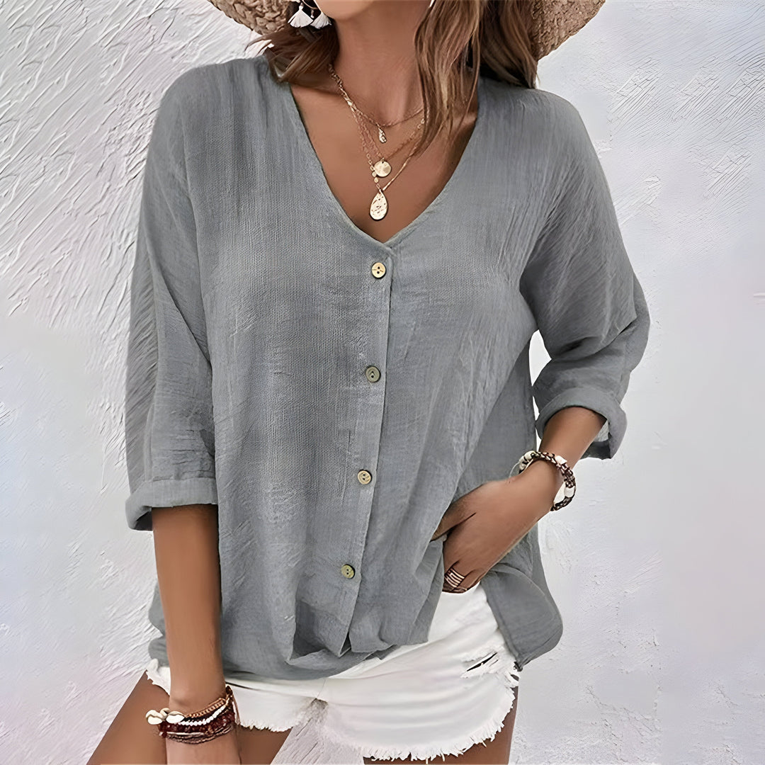 Breathable womens casual blouse, V-neck style, roll-up long sleeves, and front buttons for easy wear.