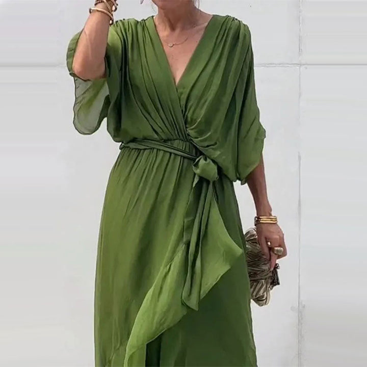 Versatile women's plus size V-neck flowy midi dress, ideal for elegant casual or party wear.