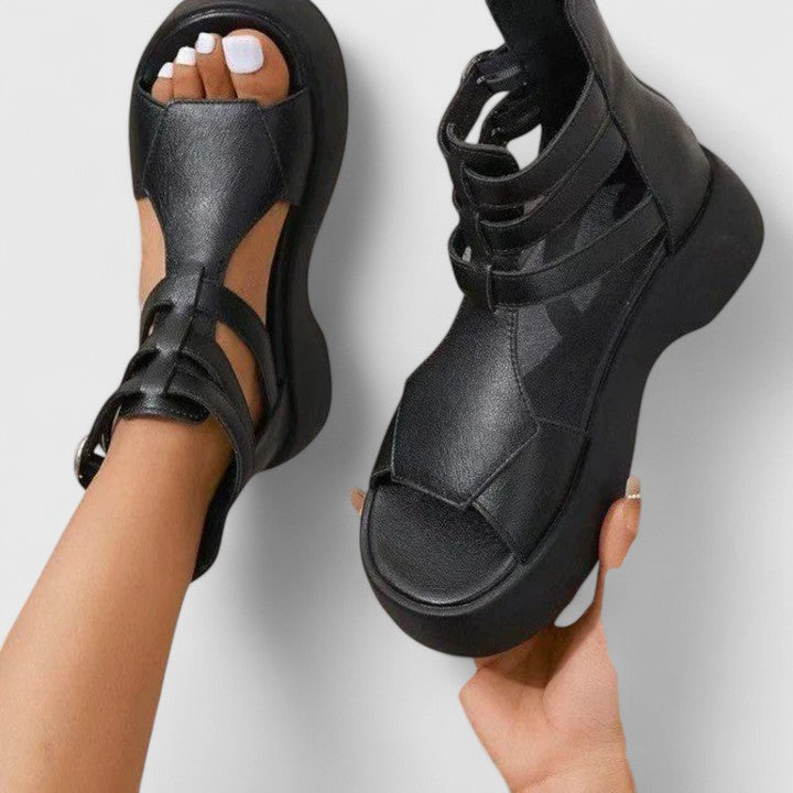 Stylish women's orthopedic platform sandals for supportive comfort. Strappy design, perfect summer footwear.