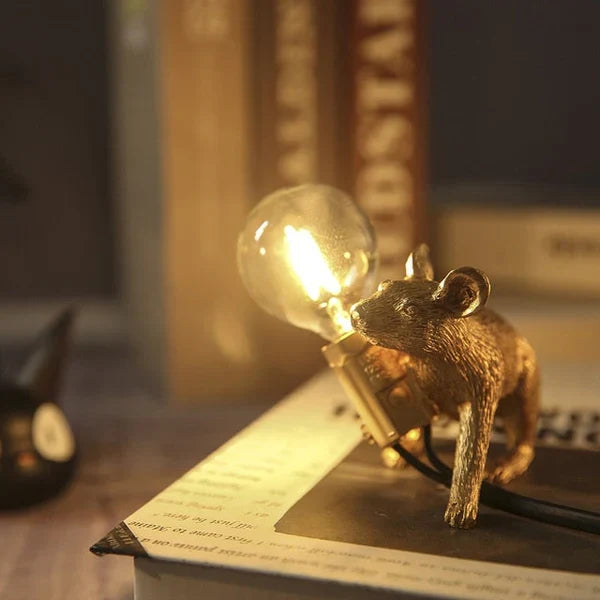 Whimsical resin mouse LED table lamp, a decorative animal lamp that brightens your space with unique charm.