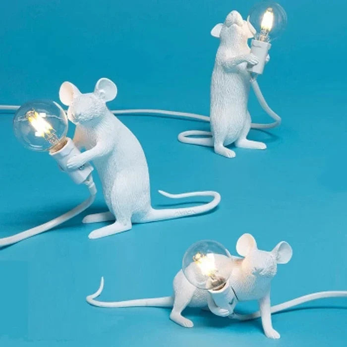 Decorative LED table lamp shaped like a resin mouse, a whimsical animal lamp providing unique and playful lighting.