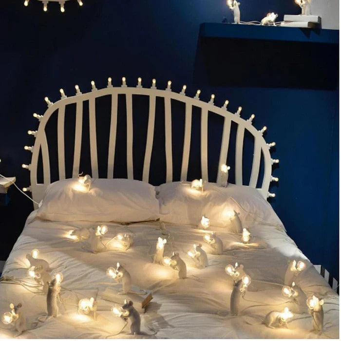 Charming resin mouse LED table lamp, an animal-themed decorative light ideal for whimsical interiors.