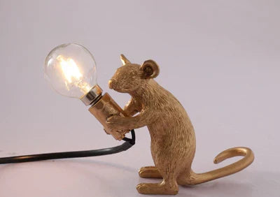 SqueakLight mouse lamp: A charming resin LED table lamp, bringing playful decor and unique lighting to any setting.