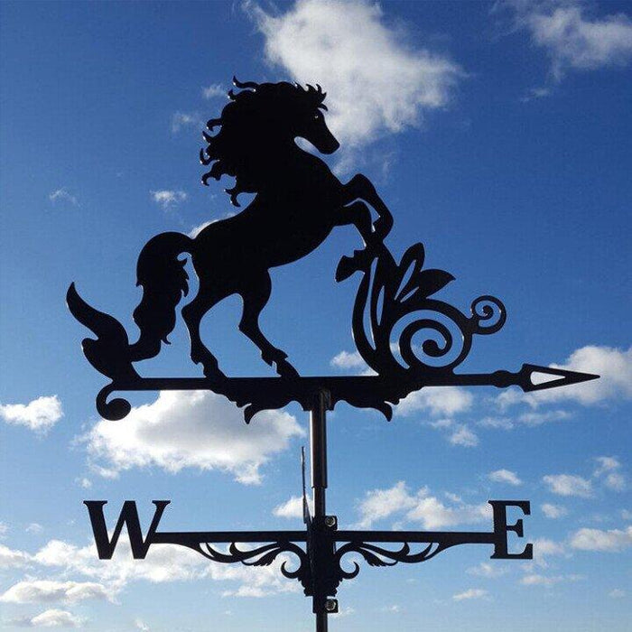 Artistic garden weather vane, an outdoor wind direction indicator and charming yard art accent piece.