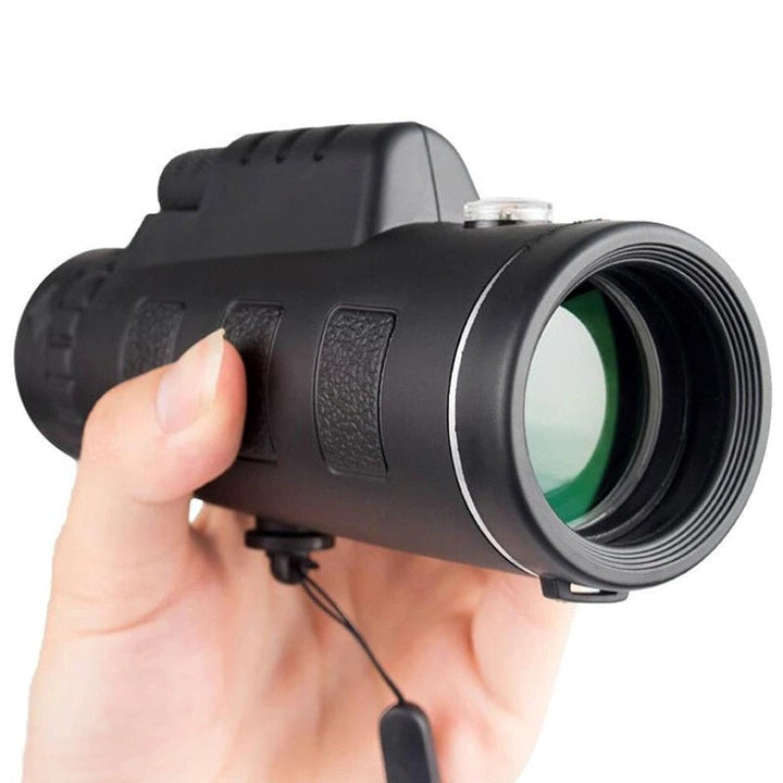 High-powered monocular telescope with smartphone clip & tripod for clear mobile photography.