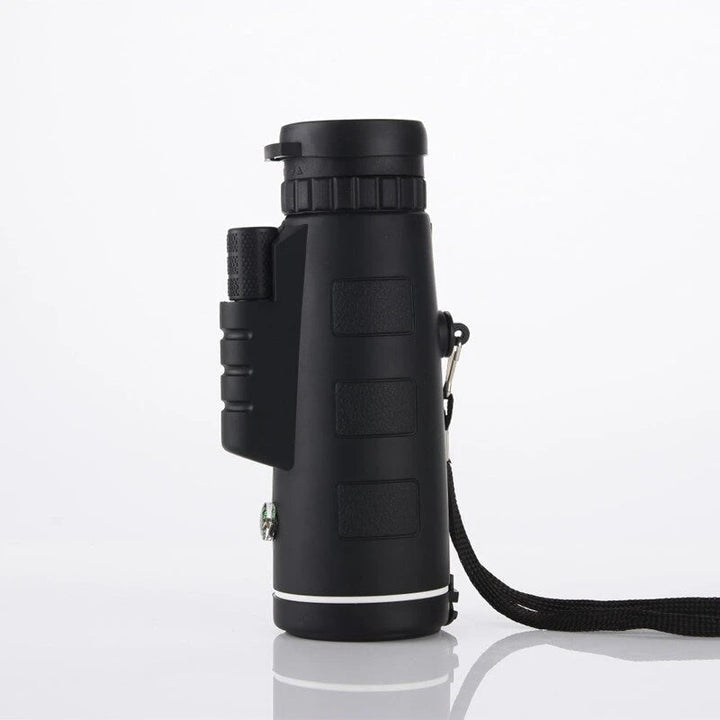 Waterproof monocular telescope ideal for wildlife observation, hiking, and outdoor adventures with tripod.