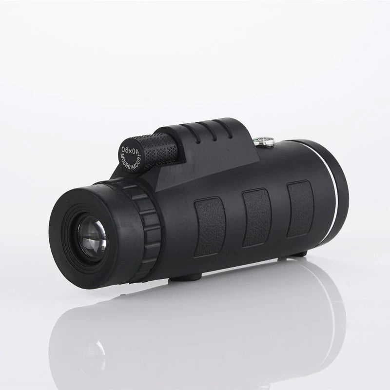 Waterproof monocular telescope kit with a sturdy tripod & smartphone adapter for outdoor use.