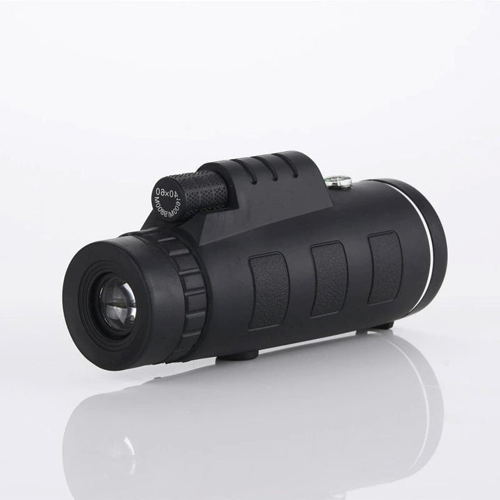 Waterproof monocular telescope kit with a sturdy tripod & smartphone adapter for outdoor use.