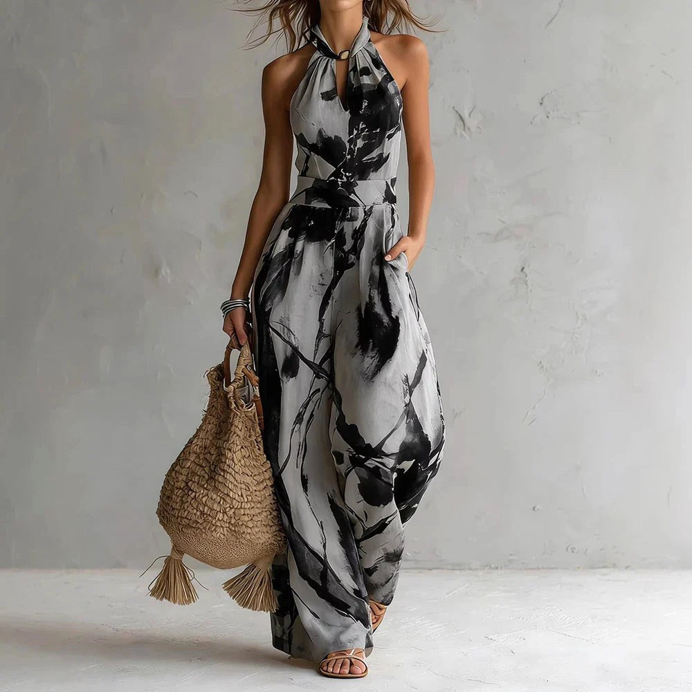 Elegant women's flowy halter maxi dress, perfect for summer evenings & special occasions.