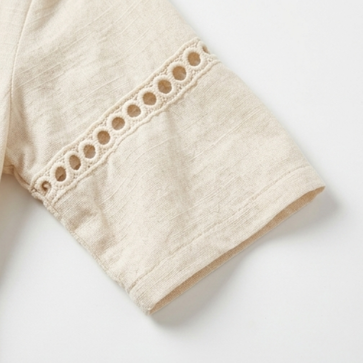 Stylish women's midi dress for vacation, featuring a deep V-neck and intricate crochet accents.