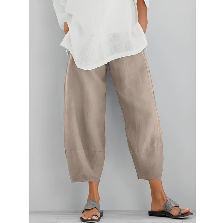 Women's chic wide leg linen pants with elastic waist, perfect for casual summer comfort & travel.
