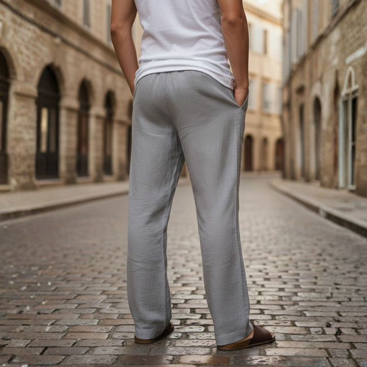 Comfortable men's wide leg pants with adjustable drawstring waist, ensuring a relaxed fit for loungewear.