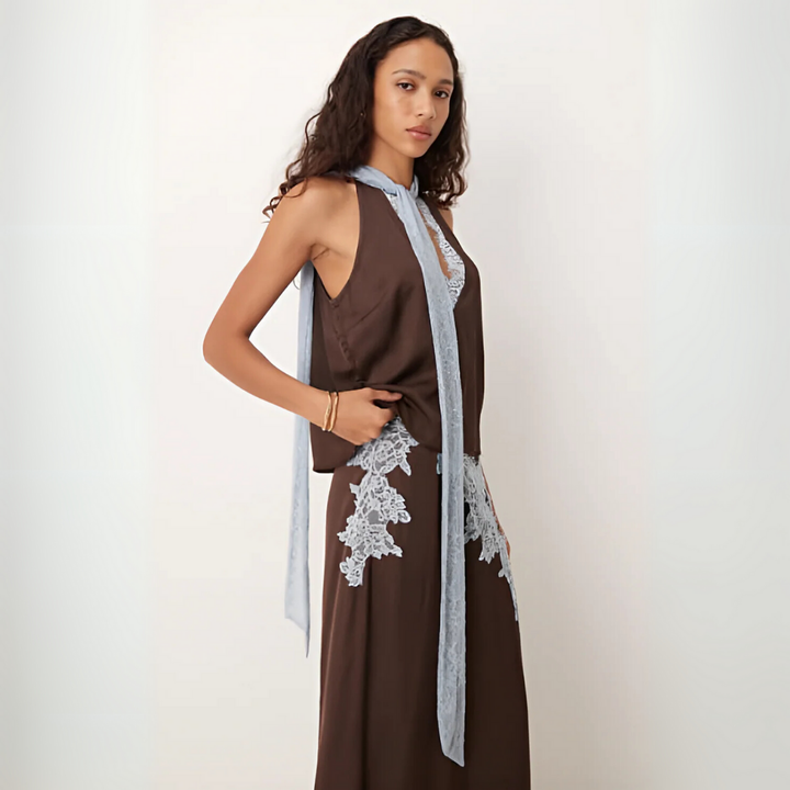 Elegant women's brown lace panel top and skirt set, perfect for formal wear or a sophisticated outfit.