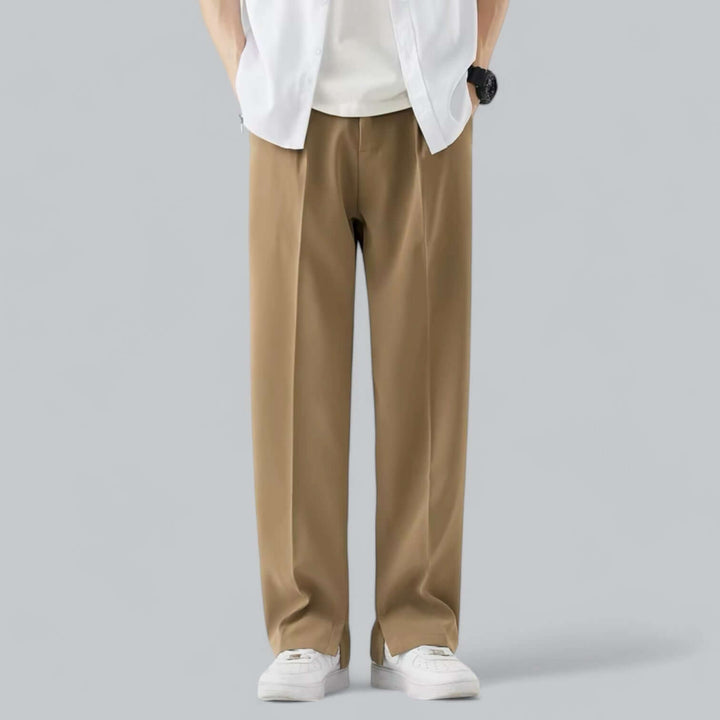 Crisp white straight leg men's trousers, offering a smart casual look for stylish summer outfits.