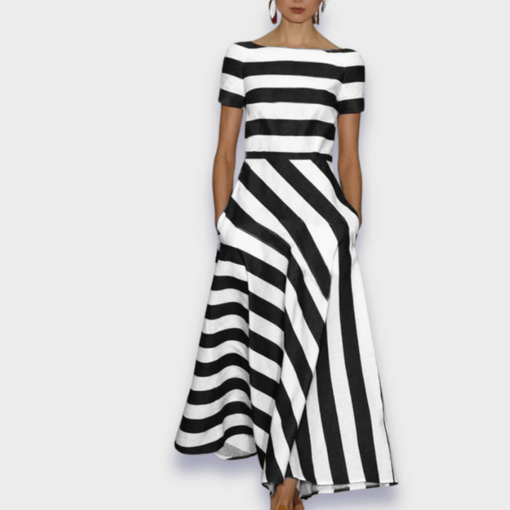 Versatile women's blue striped A-line midi dress. Ideal casual summer/spring outfit with pockets for comfort.