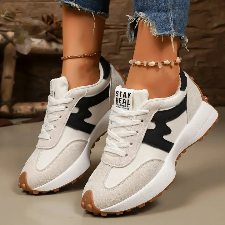 Chic women's striped platform footwear with bold stripes and a comfortable, supportive sole for daily wear.