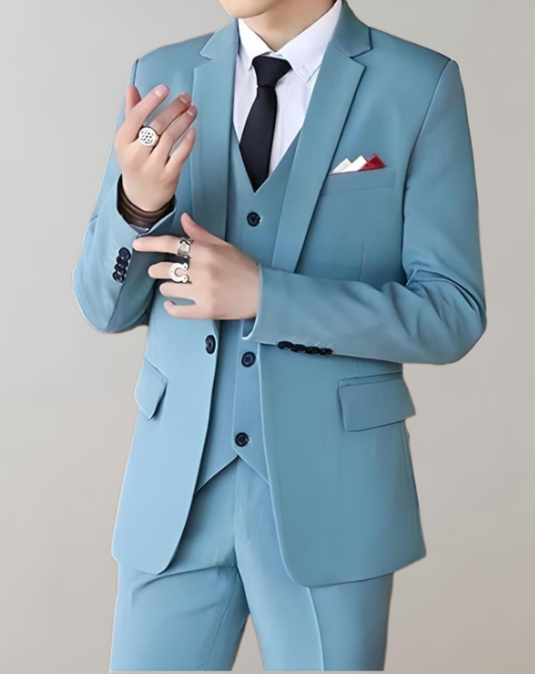 Full-body shot of a man wearing a modern 3-piece formal suit. Perfect men's fashion for weddings or business meetings.