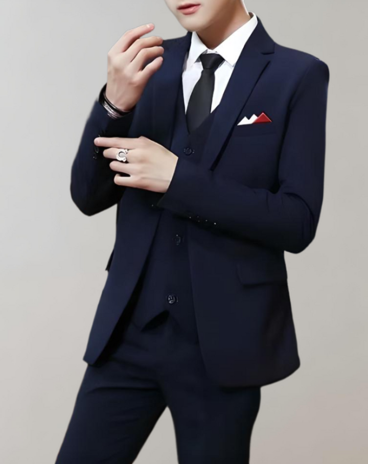Stylish men's business suit featuring a tailored jacket, waistcoat, and trousers. Perfect for formal occasions.