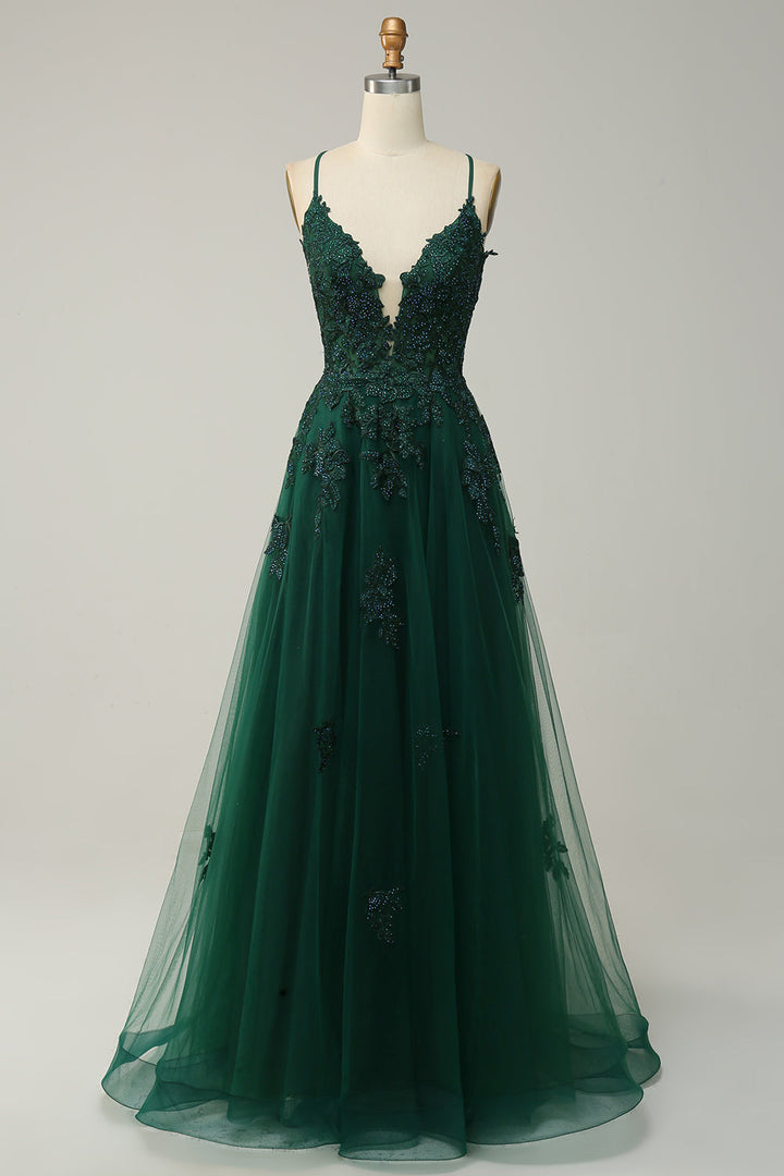 Beautiful A-line evening gown, women's formal wear with ornate appliqués & spaghetti straps.