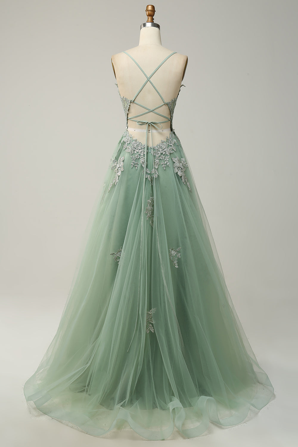Feminine A-line evening gown, women's special occasion dress with intricate appliqué details.