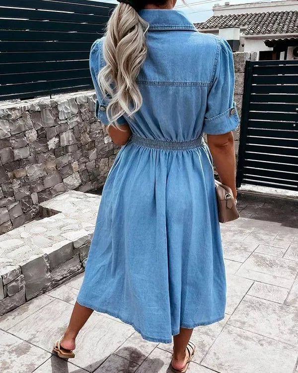 Versatile women's denim midi dress, ideal for casual occasions. Comfortable, flattering blue dress for spring/summer.
