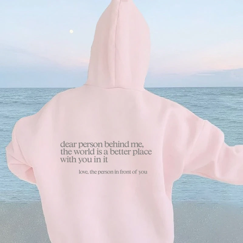 Front view: Women's Aurora inspirational hoodie, "Spread Positivity & Comfort." Long sleeve, casual style.