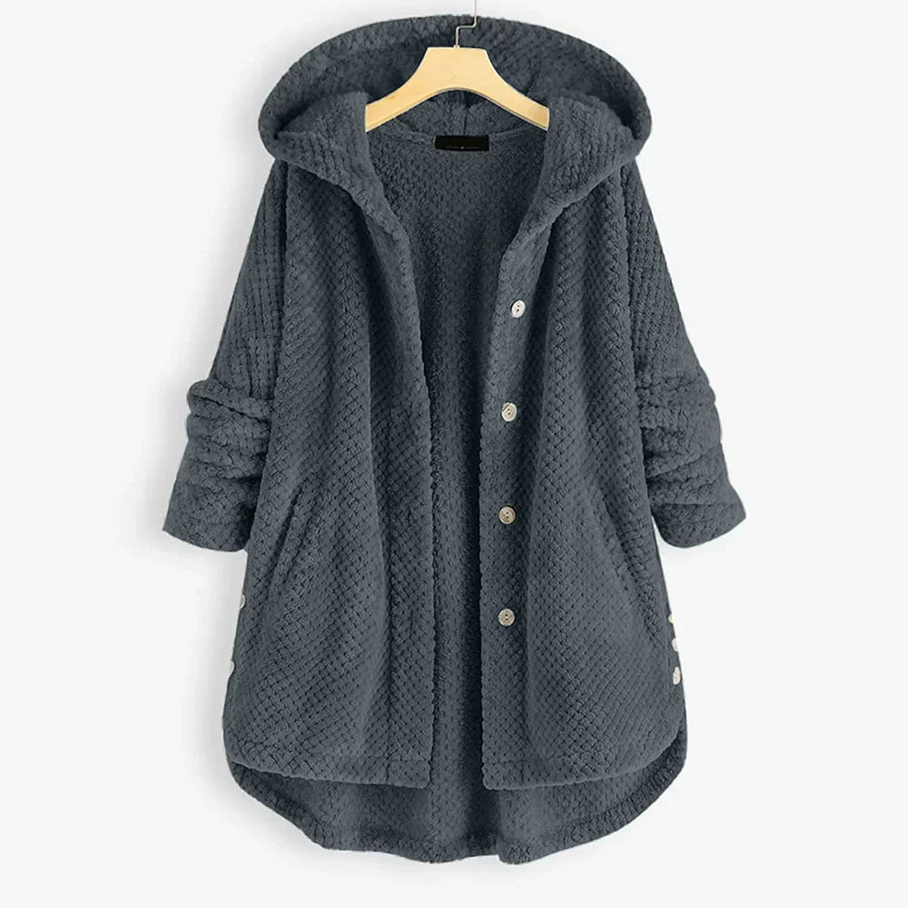 Cozy women's hooded FleeceLux jacket, warm fleece fabric, perfect for chilly days and versatile styling.