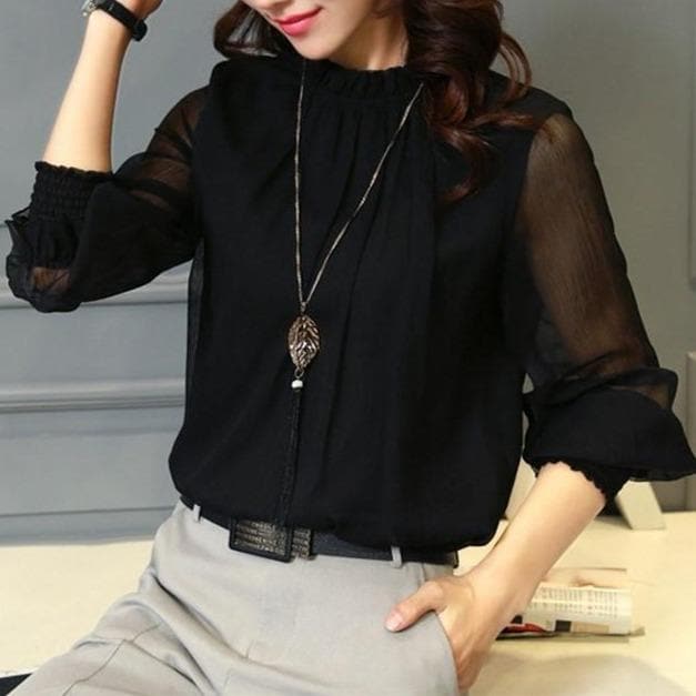 Feminine ruffled top for women, featuring elegant sheer puff sleeves and a lightweight design for comfort.