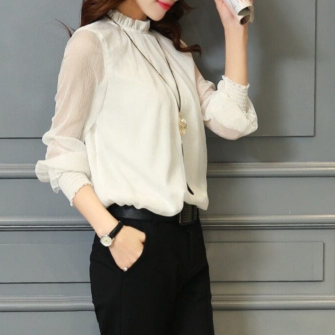 Versatile women's blouse featuring delicate ruffles and sheer puff sleeves, ideal for spring & summer fashion.