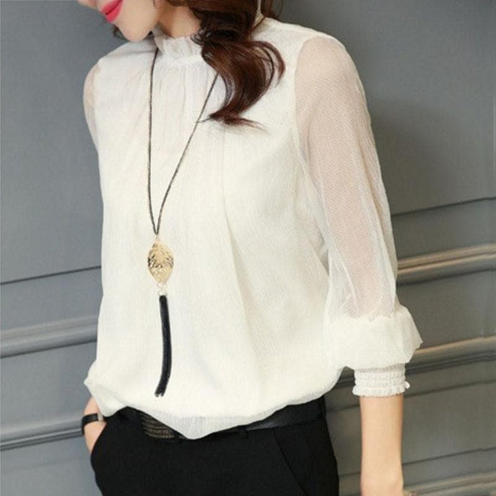 Beautiful women's elegant blouse, a ruffled top with sheer puff sleeves, perfect for sophisticated fashion.