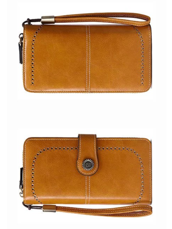 Close-up of PU leather texture on women's large capacity wristlet wallet with RFID protection.