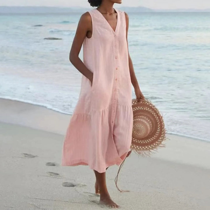 Fashionable women's V-neck summer dress in linen. A comfortable, elegant midi dress for spring & summer.