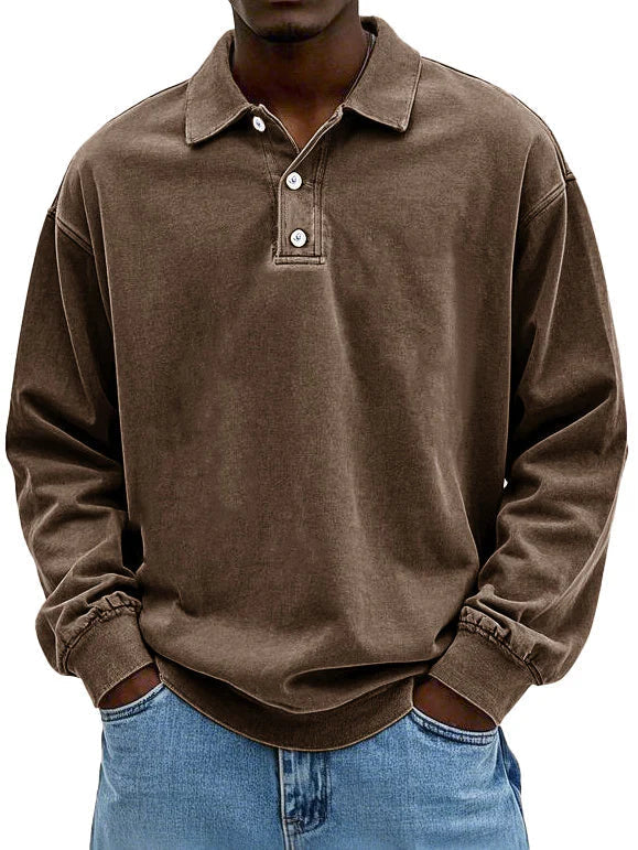 Stylish men's long-sleeve polo top, offering a clean collared look for modern men's fashion.