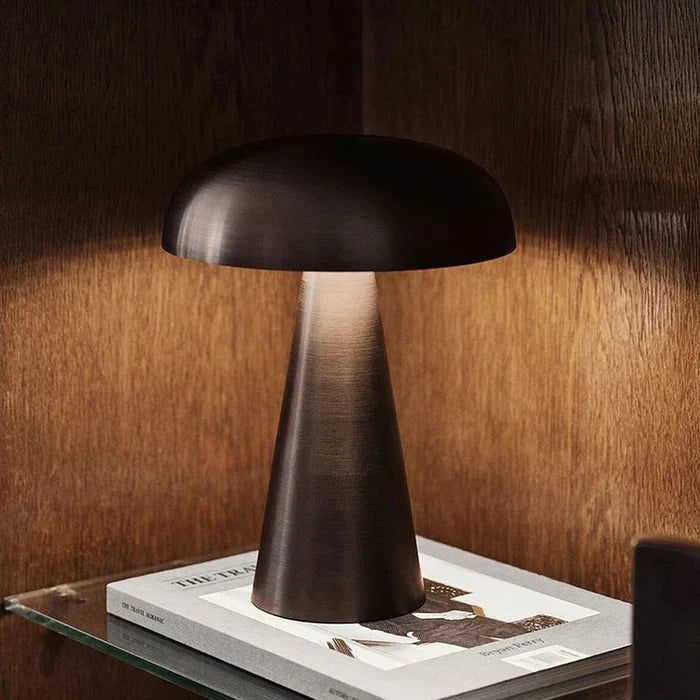 Wireless LED table lamp, modern & portable, offers convenient rechargeable ambient lighting for homes.