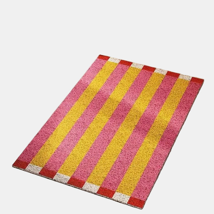Stylish striped entryway doormat, ideal for indoor and outdoor home decor. Durable, anti-slip PVC mat.