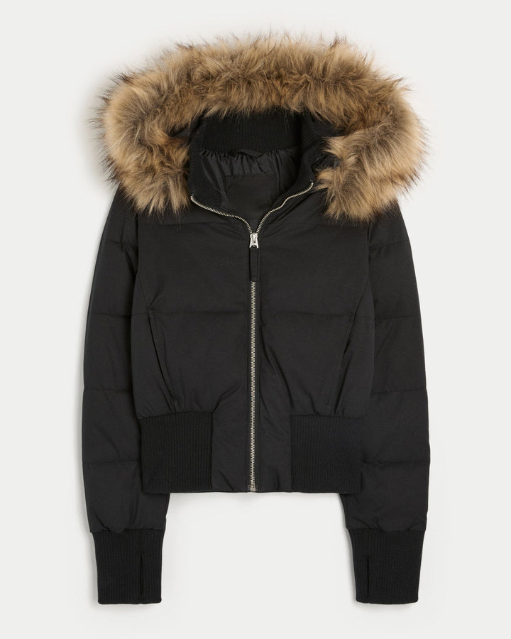 Warm and fashionable women's outerwear: a cropped quilted jacket with an adjustable, removable hood.