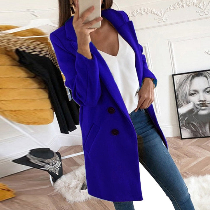 Model wearing the timeless women's Mila coat, styled for a fashionable autumn look.