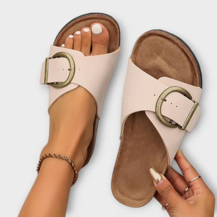 Elegant women's comfort sandals featuring strong arch support, orthopedic design, & adjustable straps for summer style.