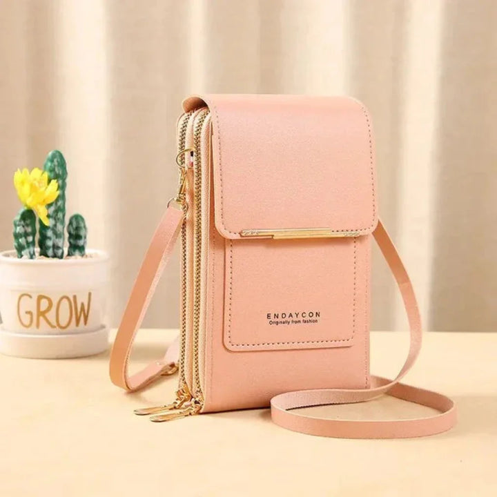 Convenient women's touch screen shoulder bag, keeps phone accessible. Perfect organized crossbody for daily use.