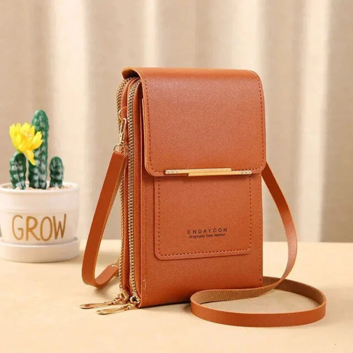 Modern women's touch screen crossbody bag, a stylish phone purse designed for easy access & daily organization.