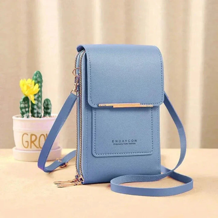 Chic women's touch screen crossbody bag, functions as a phone purse, keeping essentials organized & stylish.