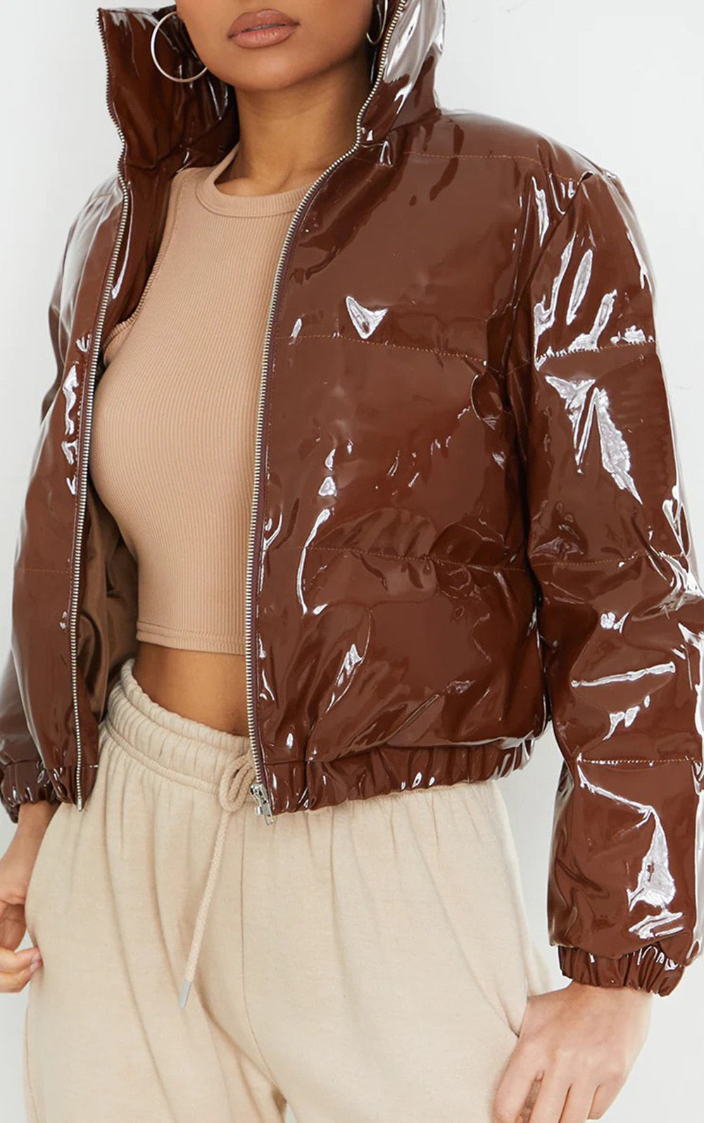 Yellow women's casual puffer bomber jacket. Warm winter outerwear, trendy.